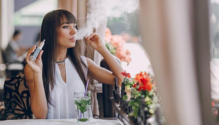 Young-Lady-Vaporizing-In-Public