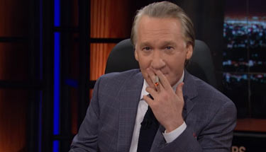 Bill-Maher-Lights-Up-A-Joint-and-Discusses-Pot-Problem-In-America-sm